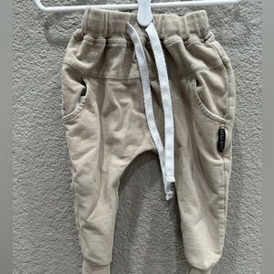 Little Bipsy joggers in color sand. Size 18-24 months.